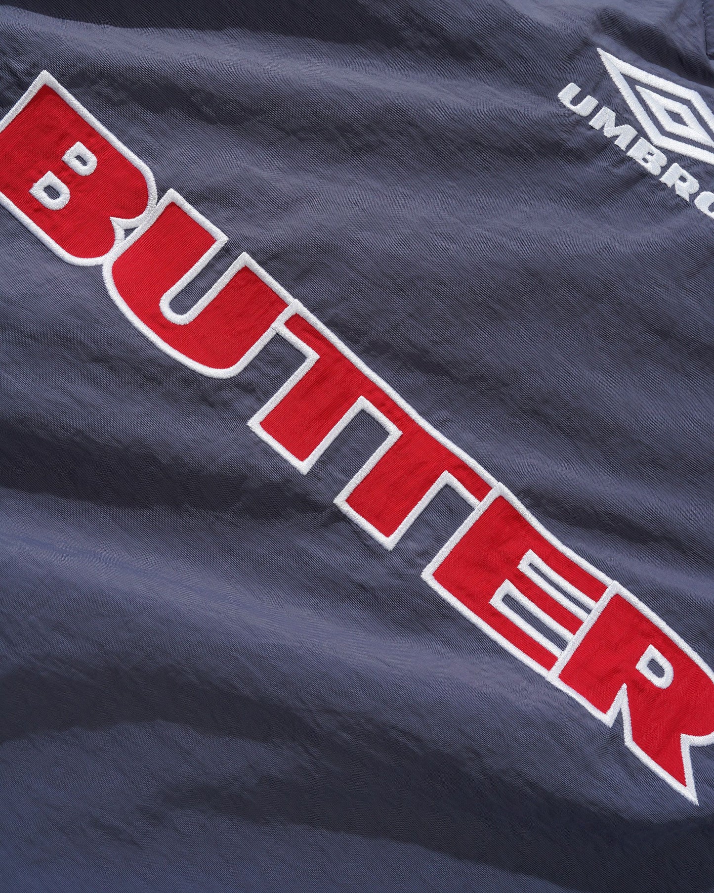 BUTTER x UMBRO TRAINING PULLOVER - SLATE / NAVY